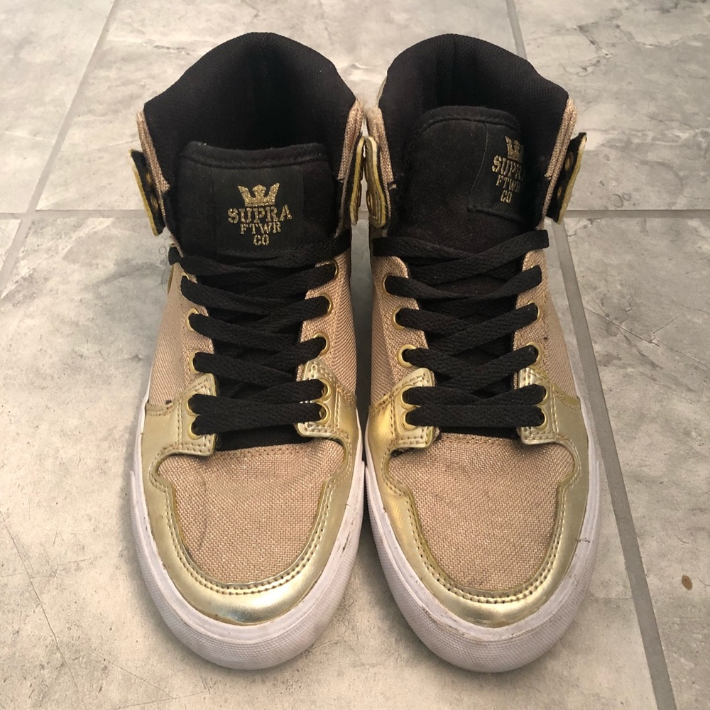 Gold Supra high tops